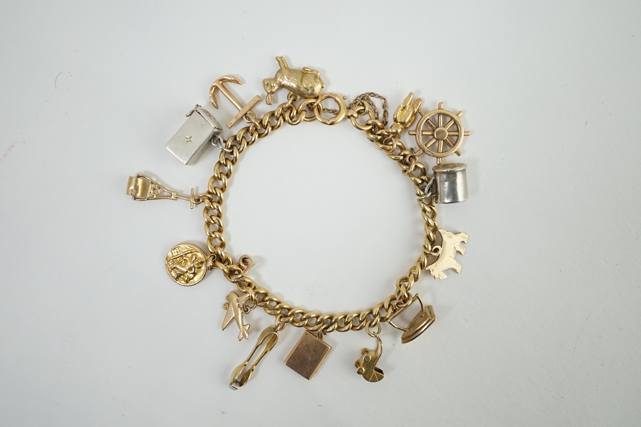 A 18ct gold charm bracelet